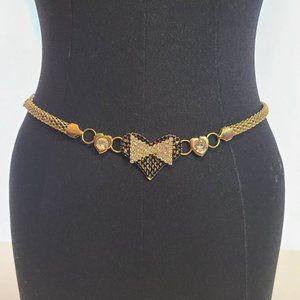 Gold Chain Belt with heart and bow at front.